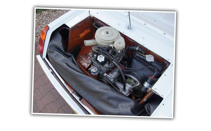 Illustration for article titled This Is A Real Car That Kept Its Engine in a Box in the Trunk
